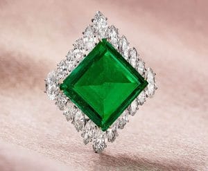 The Aga Khan Emerald, a captivating 37-carat Colombian emerald, has made headlines recently for its triumphant return to Christie's Geneva after a remarkable 55-year hiatus. 